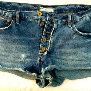 FREE PEOPLE Button Fly Distressed Denim Medium Blue Raw Hem Cutoff Shorts Sz 30